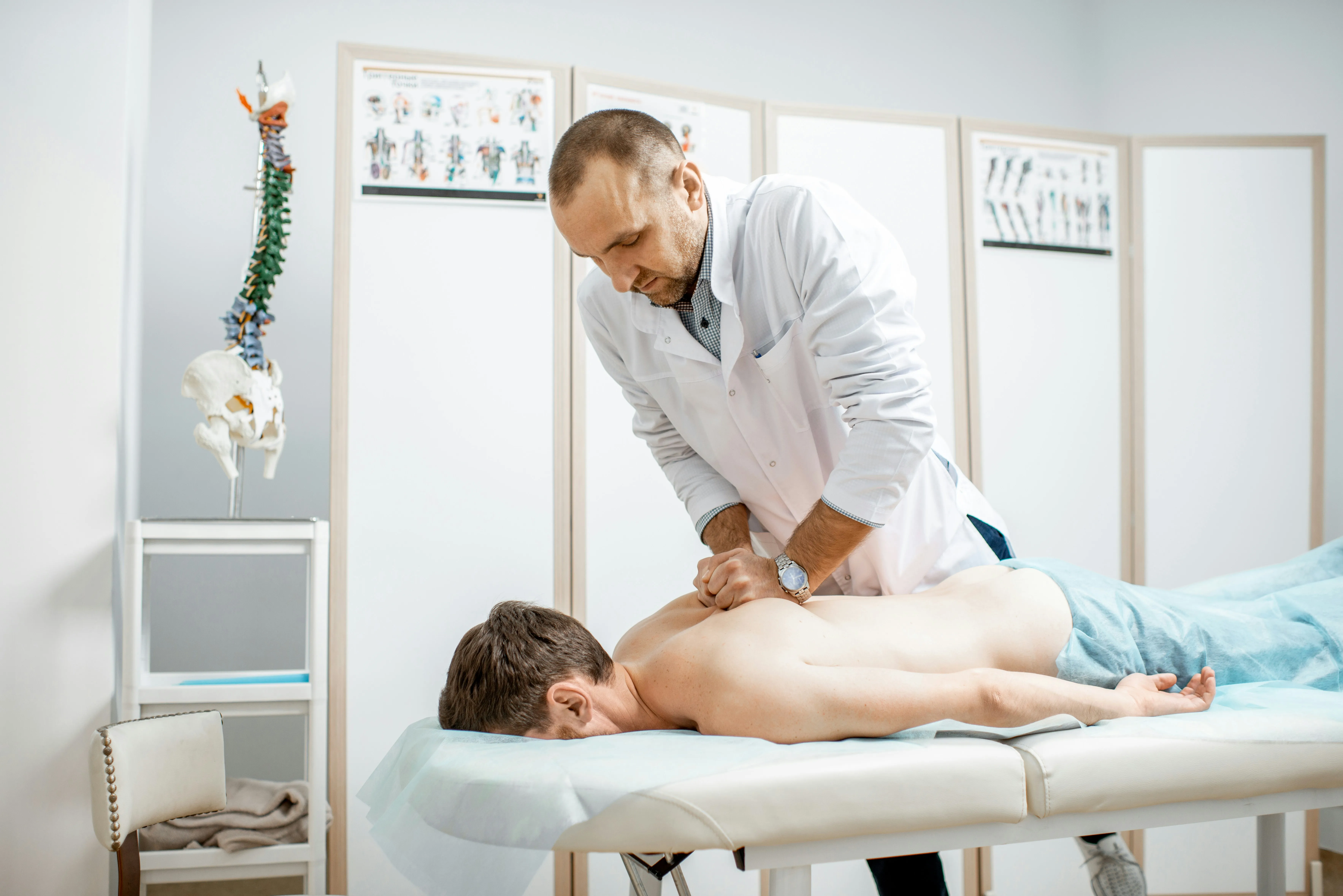 Manual therapy appointment in a calm clinic treatment space