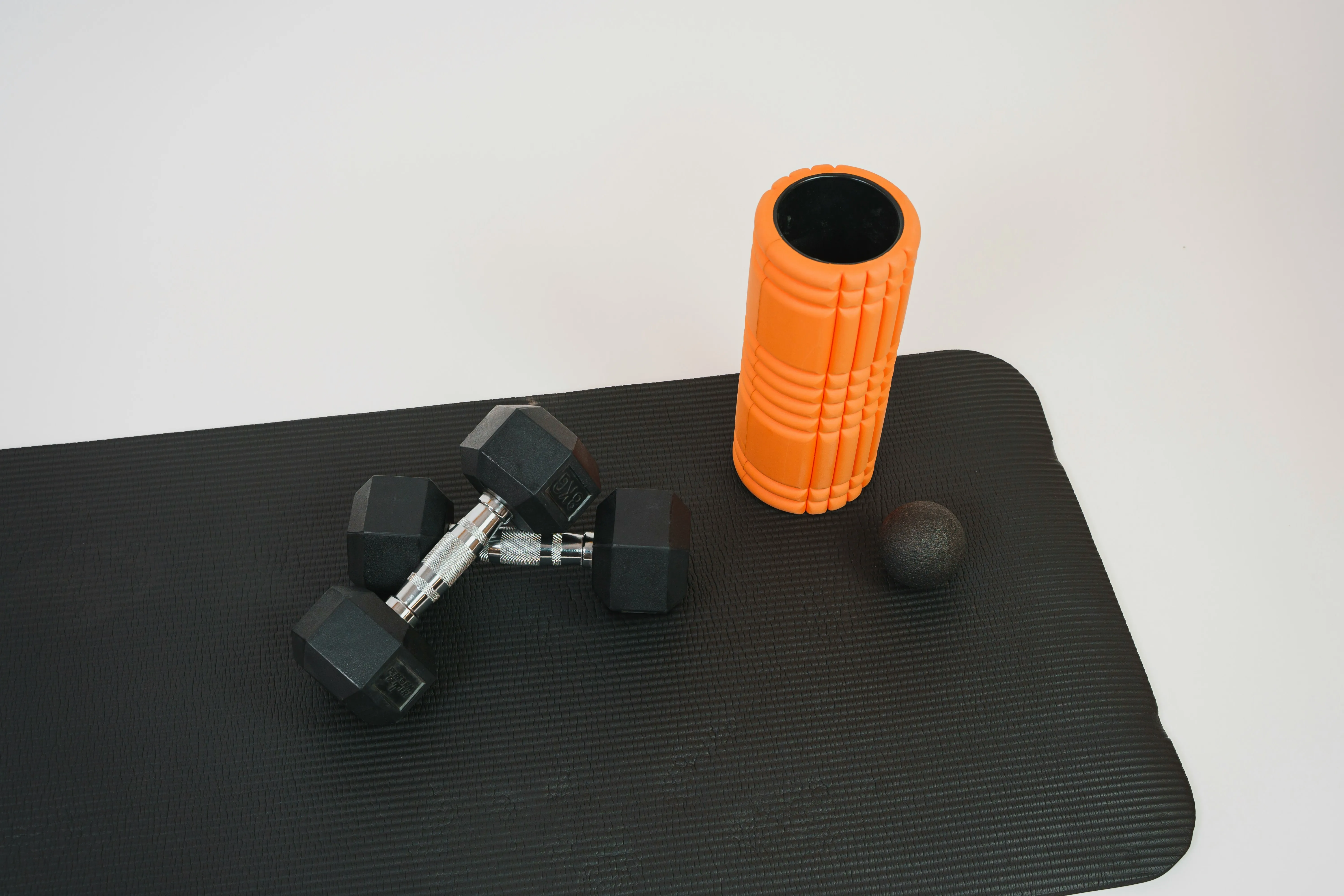 Home exercise equipment prepared for an online kinesiology appointment